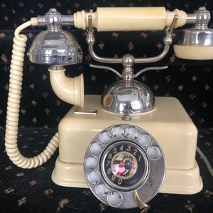 Creamy yellow vintage rotary phone reproduction